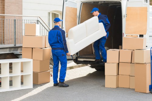 Experienced team handling furniture during relocation