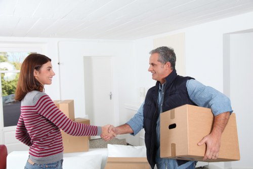 Removalist team packing items for relocation