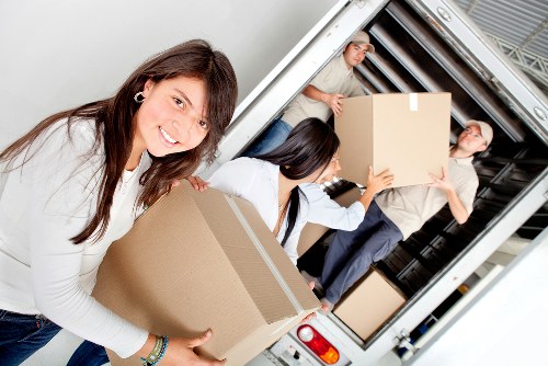 Experienced movers loading items into a removal truck in North Melbourne