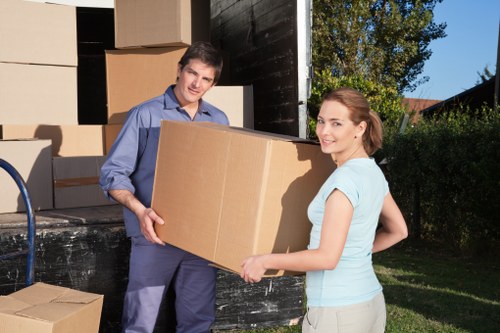 Experienced team handling furniture during a move