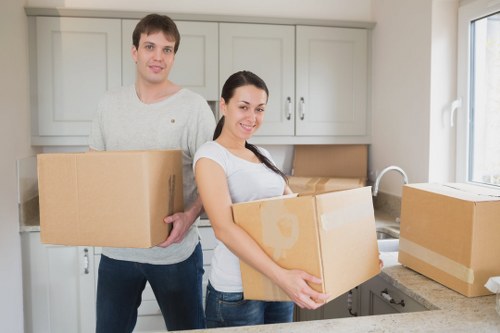 Removalists handling furniture for a residential move